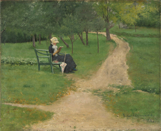 Lesende kvinne på hagebenk