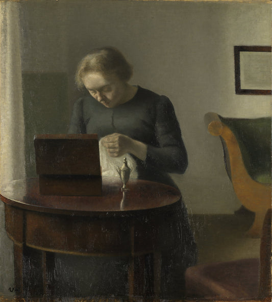 The artist's wife at the sewing table